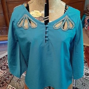 Romeo and Juliet teal blouse with beadwork.